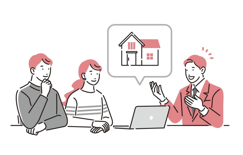 不動産を案内するビジネスパーソン男性